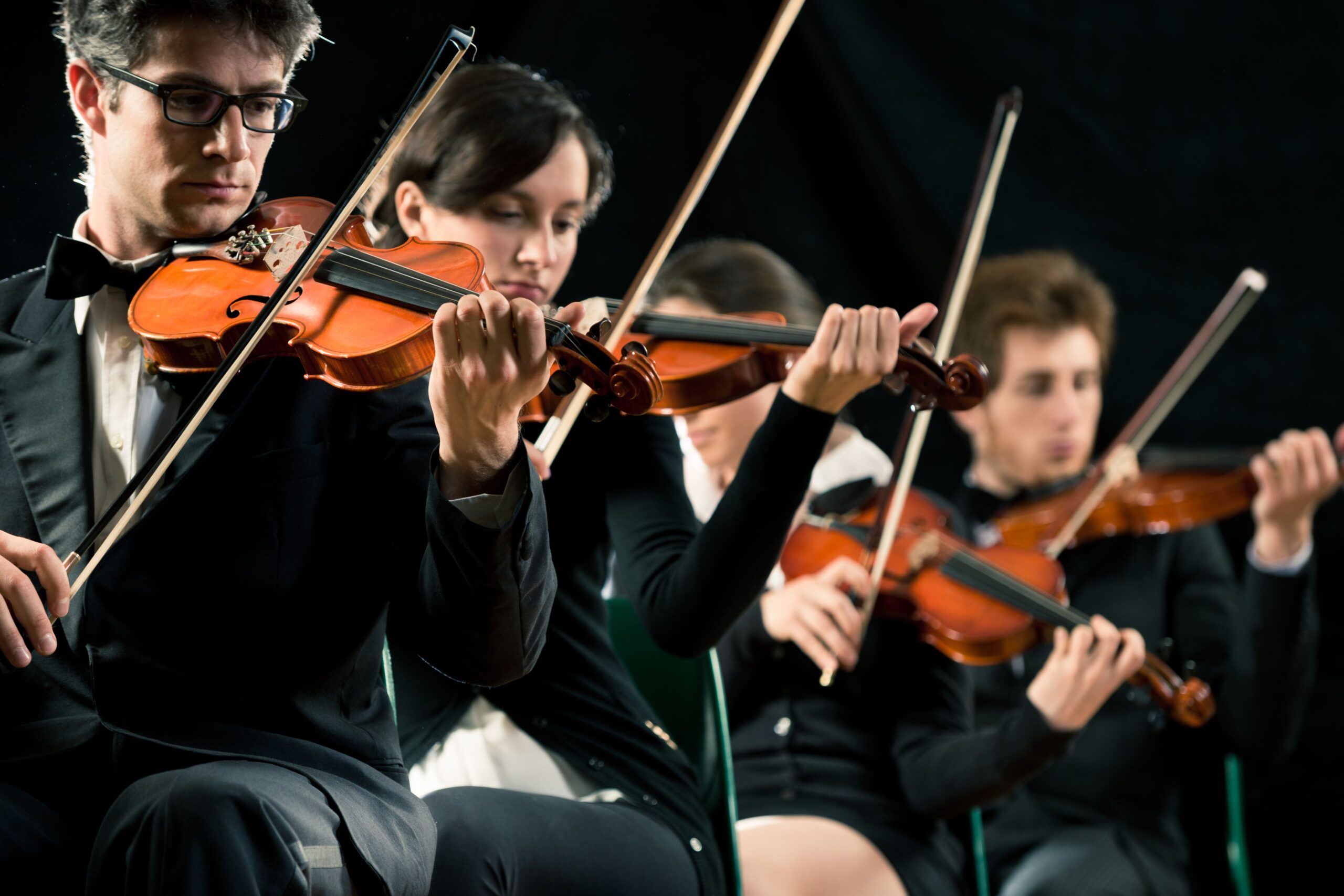 Musicians performing at music celebrations concert in European venue honoring St Cecilias Day traditions
