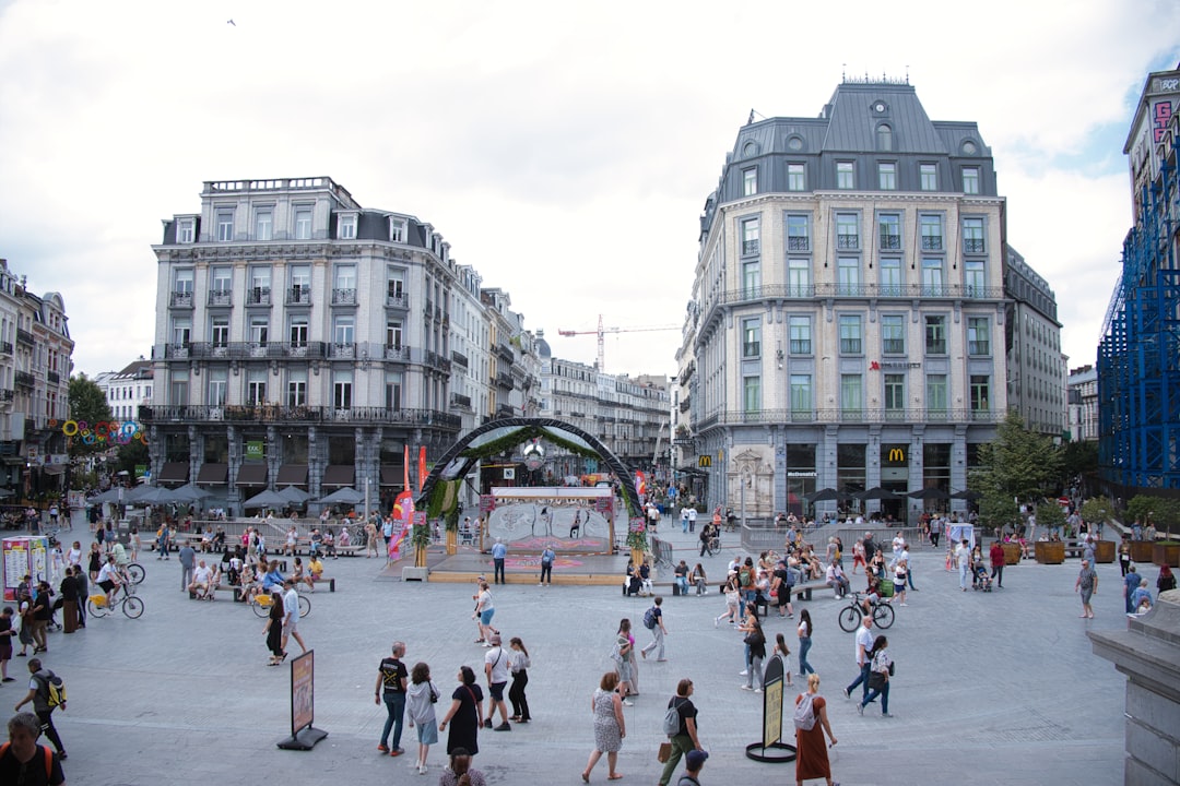 A group of visitors exploring creative installations at the NEB Festival in Brussels's Parc du Cinquantenaire