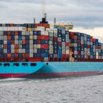 Large cargo container ship at sea transporting goods across European waters, representing EU single market trade and logistic