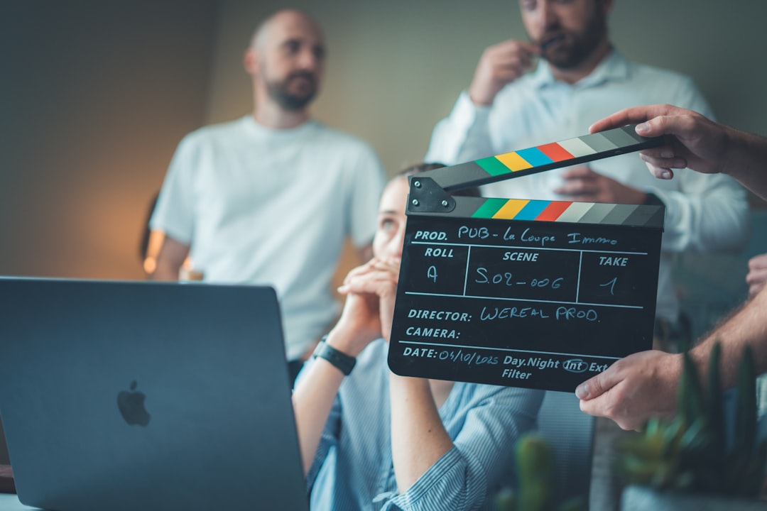 A filmmaker reviews footage on a laptop during a Creative Europe supported film production project