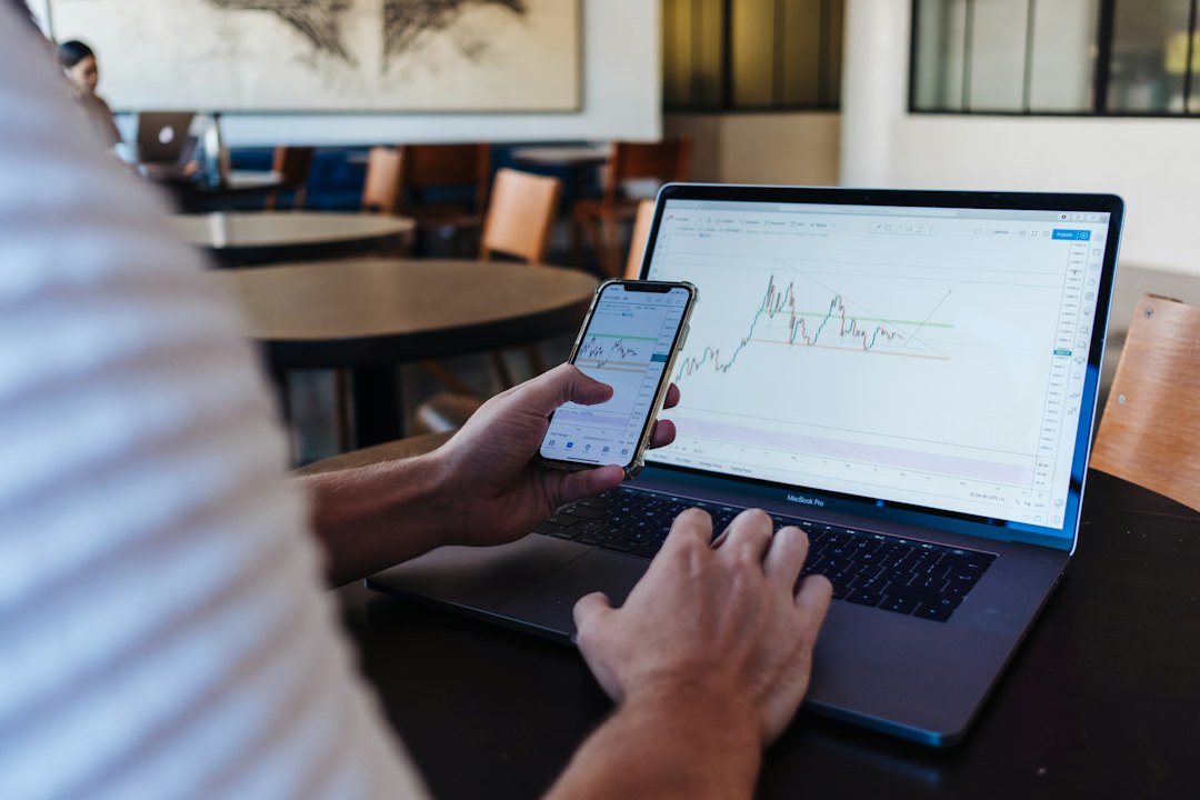 Investor checking STOXX 600 results during earnings season
